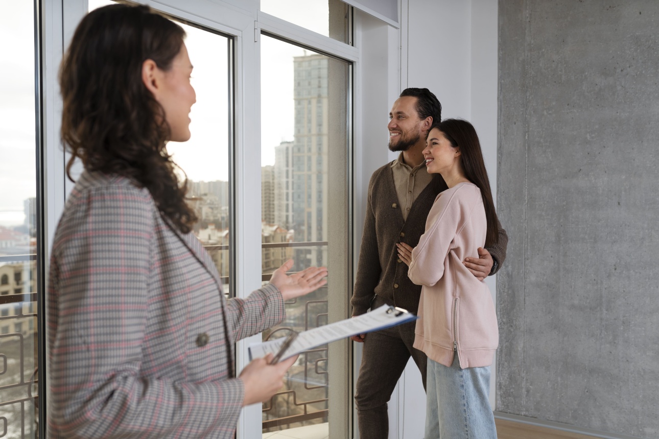 medium-shot-real-estate-agent-showing-house.jpg